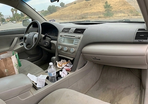 What Builds Up Inside Your Car Between Washes in Canoga Park?