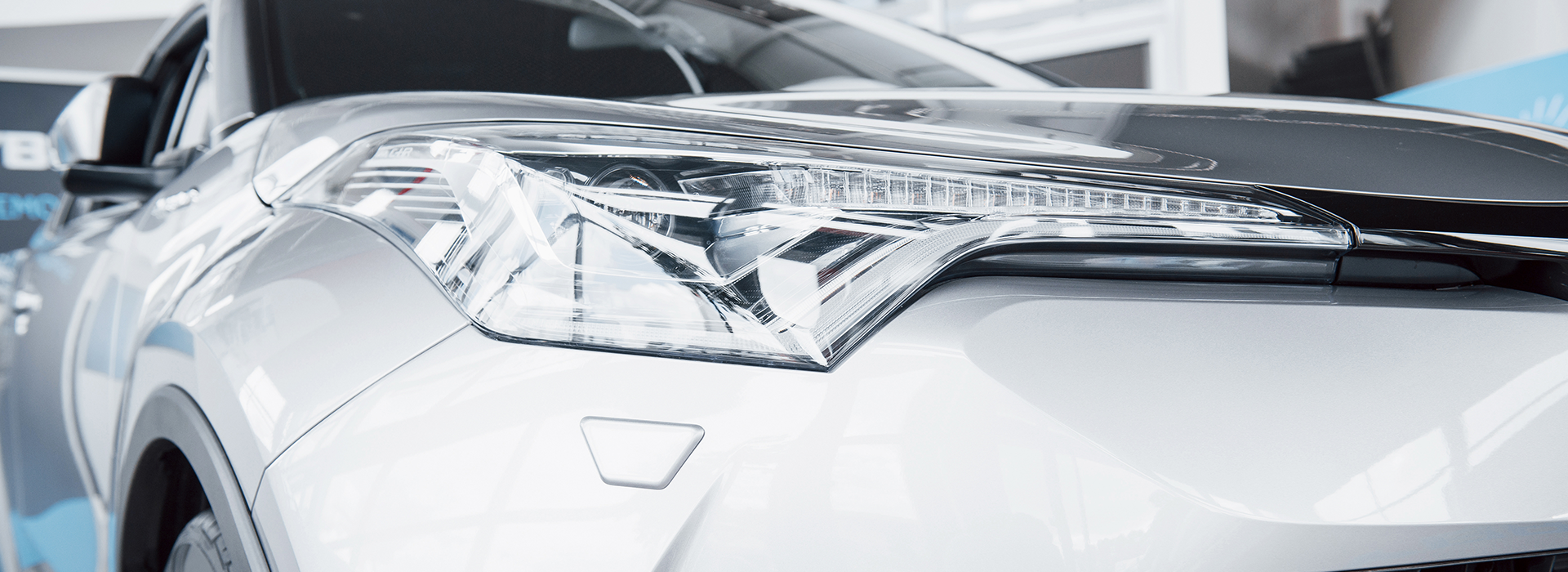 A focused car wash & wax mobile by Armando King Mobile Detailing restores a cloudy headlight.