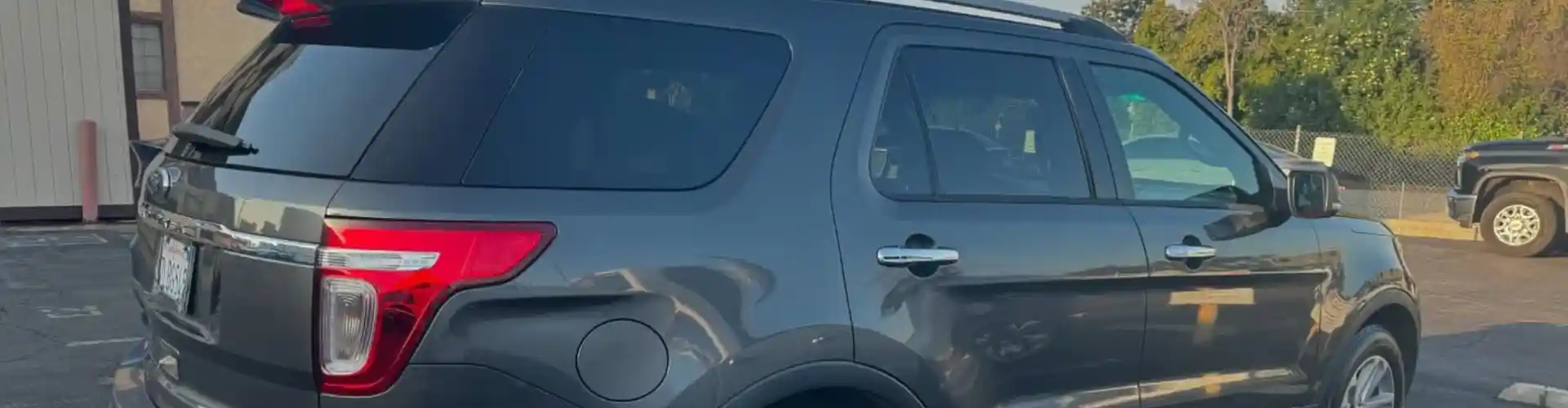 In a busy lot, Armando King Mobile Detailing offers mobile auto detailing San Fernando Valley for a Ford Explorer.