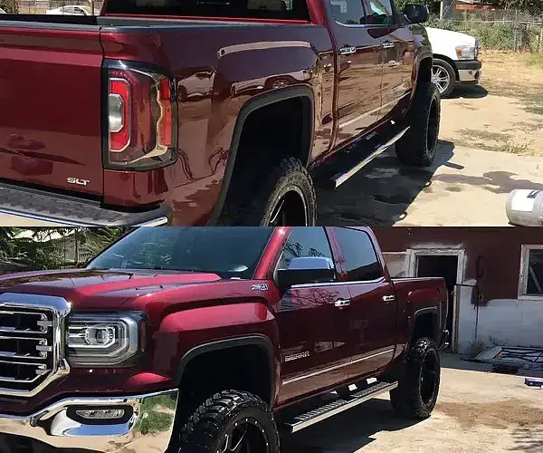 A red truck in front of a house gets mobile car detailing from Armando King Mobile Detailing.